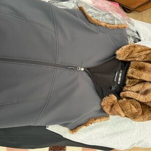 Marmot Black Vest with Brown Faux-Fur Trim and Hood